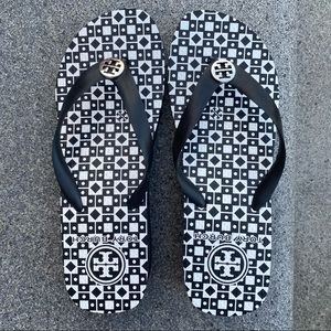 Black and white Tory Burch rubber wedge flip flops